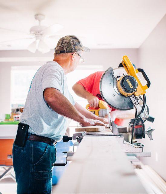 Handyman working on a kitchen renovation project